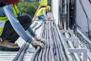 licensed commercial electrical contractor inspecting commercial panel service entrance