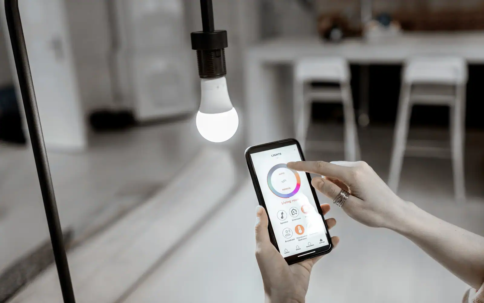 Smart lighting system controlled by a mobile device in a commercial setting
